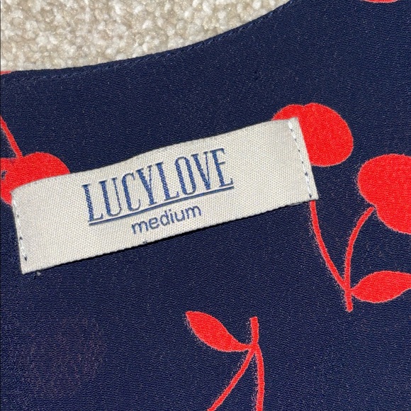 Cherry Bomb Cherry Print Tie-Front Top
Lucy Love size medium - Picture 6 of 7